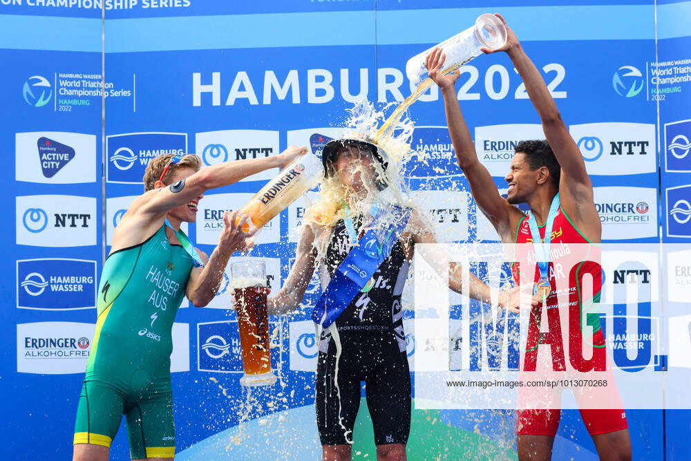 Triathlon I Men I Hamburg Water World Triathlon Championship Series I 09 07 2022 Award Ceremony and Beer Shower MatthewHauser, Australia Hayden Wilde, New Zealand Jawad Abdelmoula, Morocco