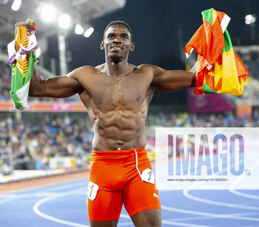5th August 2022; Alexander Stadium, Birmingham, Midlands, England: Day 8 of the 2022 Commonwealth Games: Lindon Victor (GRN) with his national flag and shirtless after winning the Gold Medal in the Men s Decathlon ActionPlus12414735 RolandxHarrison