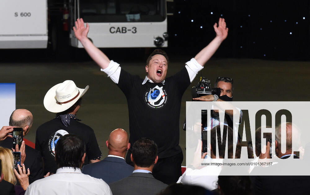 SpaceX CEO Elon Musk celebrates the successful launch of a Falcon 9 rocket with the Crew Dragon spacecraft from pad 39A at the Kennedy Space Center during a post launch event at NASA s Vehicle Assembly Building with U.S. President Donald Trump and Vice President Mike Pence. NASA astronauts Doug Hurley and Bob Behnken will rendezvous and dock with the International Space Station, becoming the first people to launch into space from American soil since the end of the Space Shuttle program in 2011. Cape Canaveral United States - ZUMAs197 20200530_zaa_s197_178