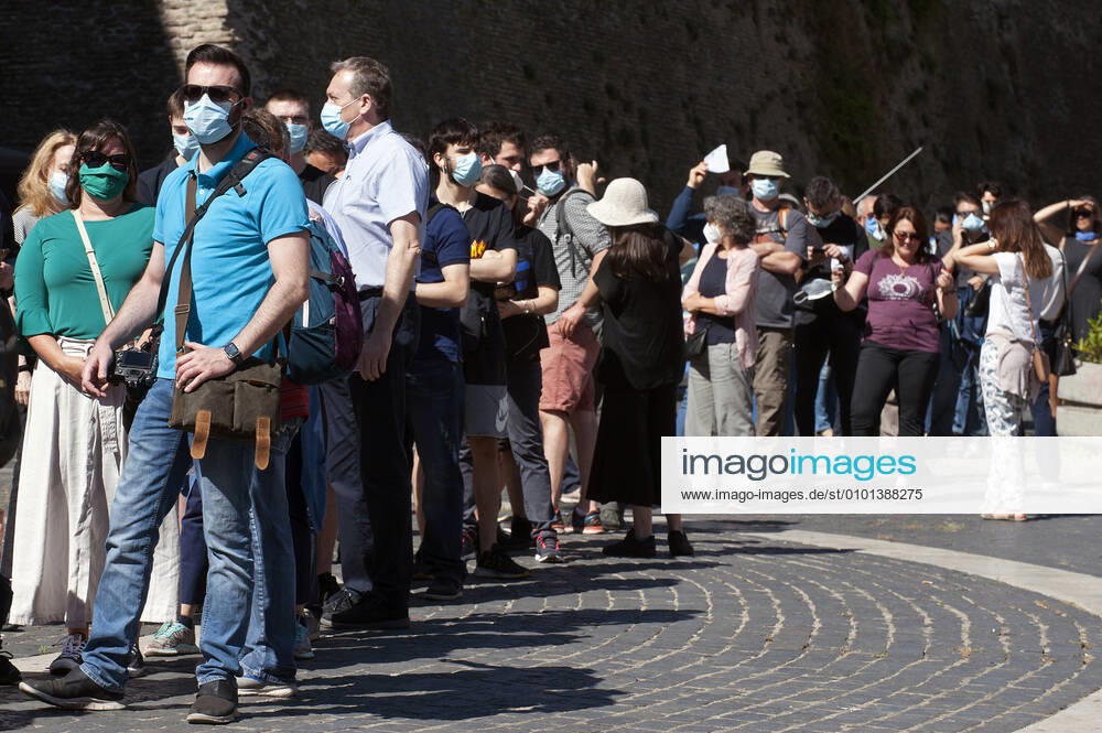 NO FRANCE - NO SWITZERLAND: June 1, 2020 : Visitors line up to enter the Vatican Museums (Musei Vaticani) which reopen to the public in The Vatican, while the city-state eases its lockdown aimed at curbing the spread of the COVID-19 infection, caused by the novel coronavirus