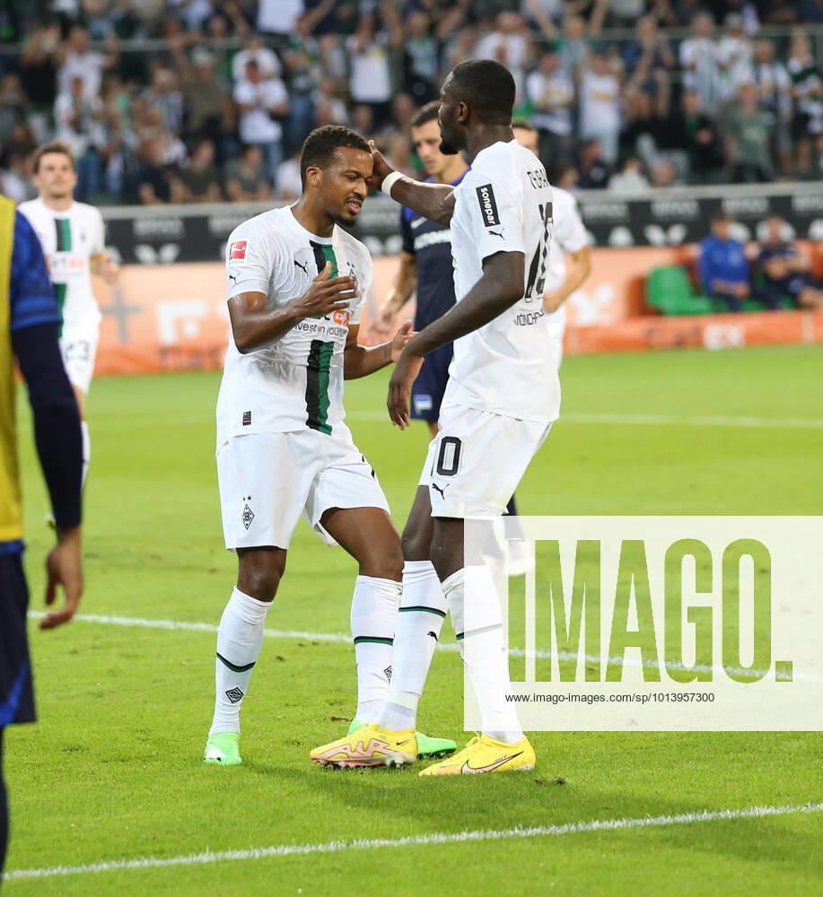 Football,GER, Season 2022 2023 1 Bundesliga 3 Matchday VFL Borussia Mönchengladbach Hertha BSC Berlin Alassane Plea 14 BMG Goalscorer to 1 0 by Penalty Congratulator Marcus Thuram 10 BMG DFL REGULATIONS PROHIBIT ANY USE OF PHOTOGRAPHS AS IMAGE SEQENCES AND OR QUASI VIDEO 1 Football Bundesliga Borussia Mönchengladbach Hertha BSC Berlin 3 Matchday
