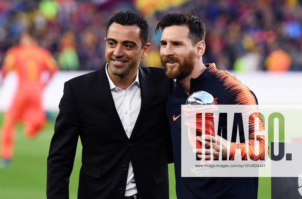 FC Barcelona, Barca v Real Sociedad. La Liga date 38, Camp Nou stadium, Barcelona, Spain - 20 May 2018 The ex FC Barcelona player Xavi Hernandez with Lionel Messi. FC Barcelona v Real Sociedad. La Liga date 38, Camp Nou stadium, Barcelona, Spain - 20 May 2018. Mandatory Credit: Sergio Ruiz (PRESSINPHOTO). Barcelona SPA