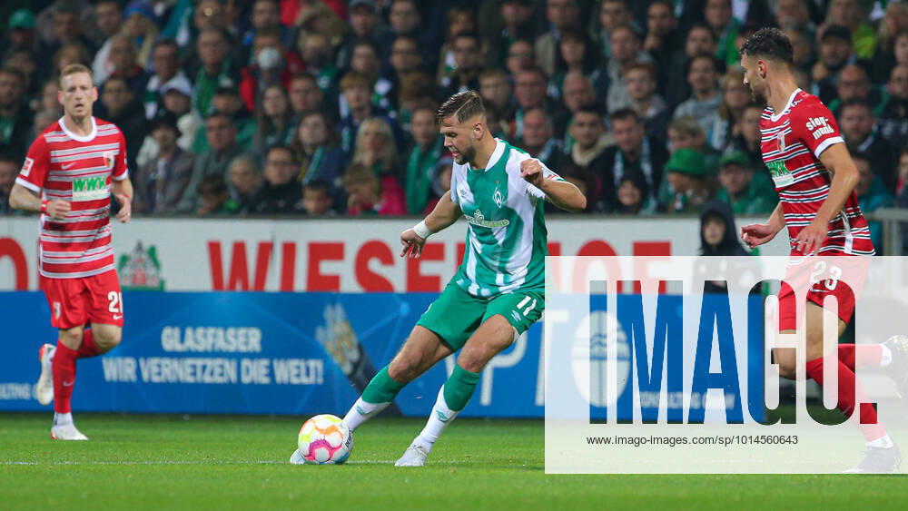 V li Niclas Füllkrug SV Werder Bremen, 11 on the ball, single image, full body, action, game scene, THE DFL DIRECTIVES PROHIBIT ANY USE OF PHOTOGRAPHS AS IMAGE SEQUENCES AND OR VIDEO DFL REGULATES PROHIBIT ANY USE OF PHOTOGRAPHS AS IMAGE SEQUENCES AND OR QUASI VIDEO , 09 09 2022, Bremen Germany , Football, Bundesliga, SV Werder Bremen FC Augsburg