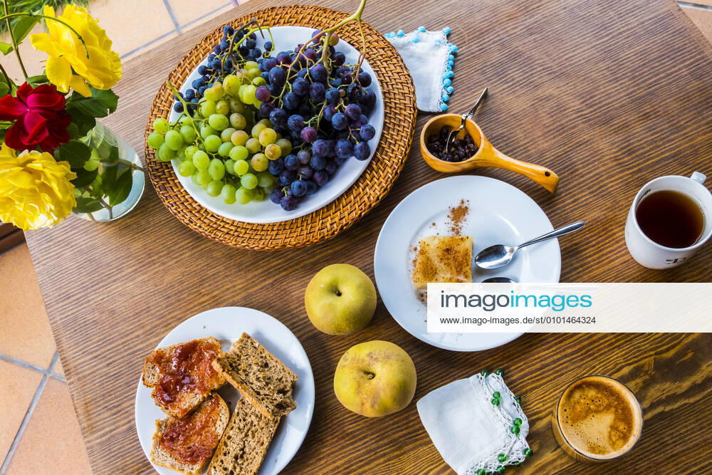 Breakfast with toast, cake and fruit