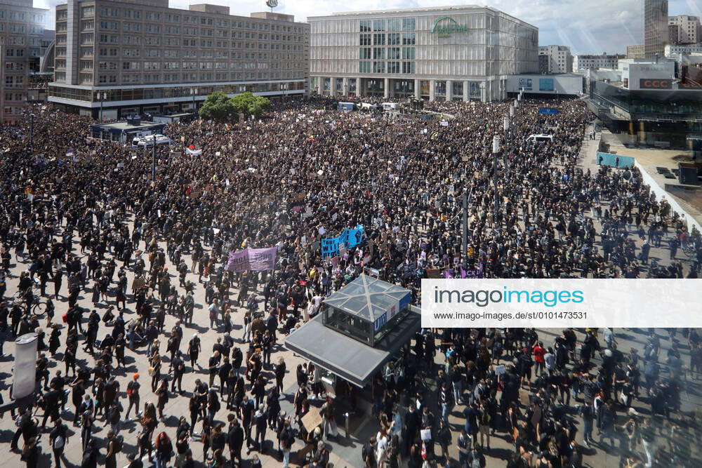 Berlin Germany People gather for the Silent Demo at Alexanderplatz to protest against police violence because of the death of African-American George Floyd