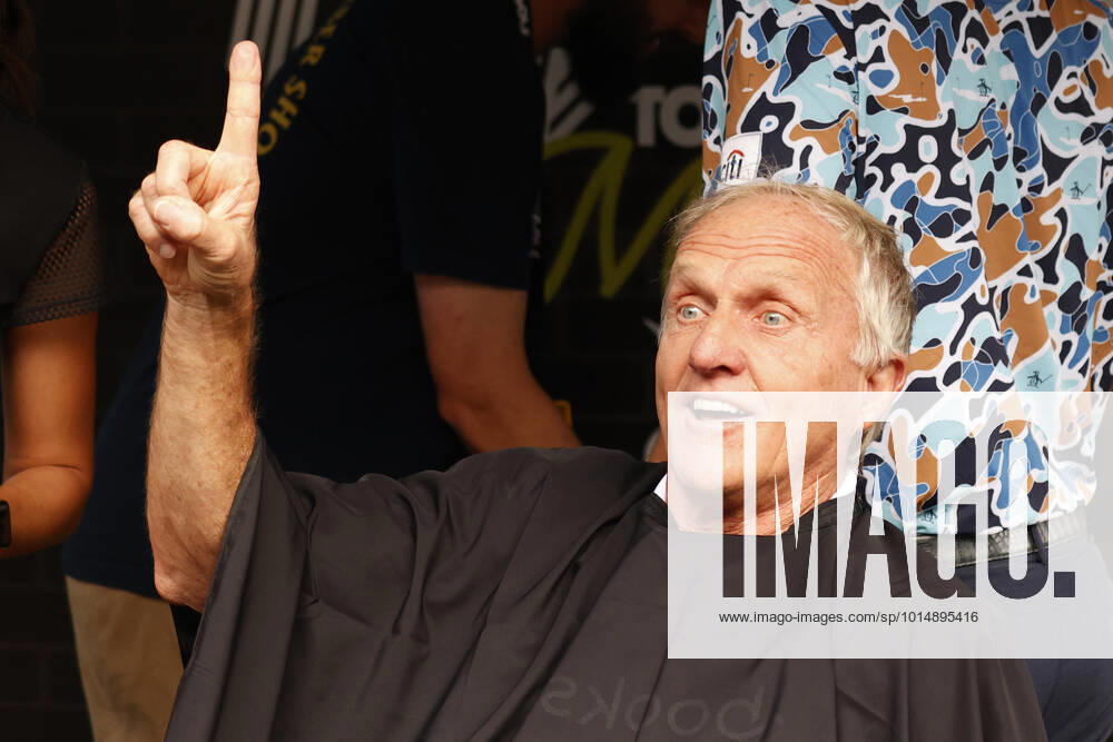 SUGAR GROVE, IL - SEPTEMBER 17: Greg Norman the LIV CEO and golf commissioner as Norman holds up a number one while getting a mullet hair cut for charity after the second round of the LIV Golf Invitational Series Chicago on September 17, 2022 at Rich Harvest Farms in Sugar Grove, Illinois. (Photo by Brian Spurlock Icon Sportswire) GOLF: SEP 17 LIV Golf Invitational Series Chicago Icon220917085