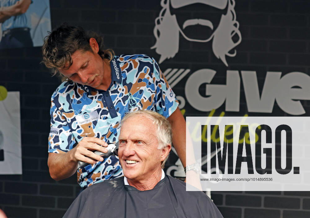 SUGAR GROVE, IL - SEPTEMBER 17: LIV golfer Cameron Smith gives Greg Norman the LIV CEO and golf commissioner a mullet hair cut for charity after the second round of the LIV Golf Invitational Series Chicago on September 17, 2022 at Rich Harvest Farms in Sugar Grove, Illinois. (Photo by Brian Spurlock Icon Sportswire) GOLF: SEP 17 LIV Golf Invitational Series Chicago Icon220917095