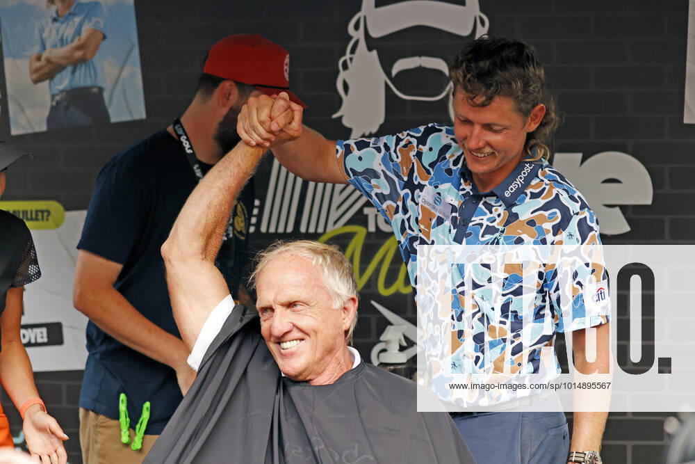 SUGAR GROVE, IL - SEPTEMBER 17: LIV golfer Cameron Smith shake hands as he gives Greg Norman the LIV CEO and golf commissioner a mullet hair cut for charity after the second round of the LIV Golf Invitational Series Chicago on September 17, 2022 at Rich Harvest Farms in Sugar Grove, Illinois. (Photo by Brian Spurlock Icon Sportswire) GOLF: SEP 17 LIV Golf Invitational Series Chicago Icon220917096