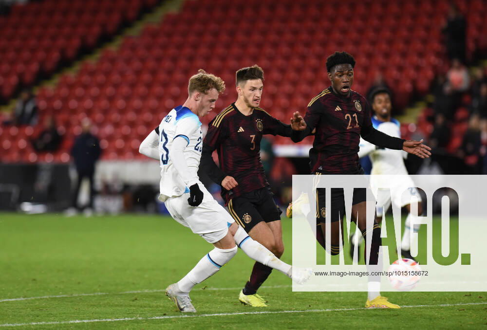 Cole Palmer (Manchester City) of England U21, U 21 scores a goal while Noah Katterbach (FC Basel) of Germany U21 & Faride Alidou (Hamburger SV)) of Germany U21 look on during the International Friendly, L?nderspiel, Nationalmannschaft match between England U21 and Germany U21 at Bramall Lane, Sheffield, England on 27 September 2022.