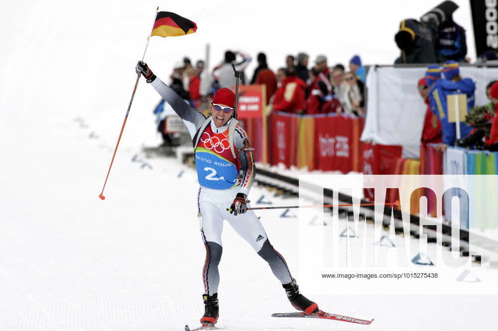 SAN SICARIO 20060221 Biathlon, mens, 4x7.5km Picture Germanys Michael Greis celebrates as he crosses the finish line to give Germany Olympic gold in the biathlon relay TURIN ITALY Olympics