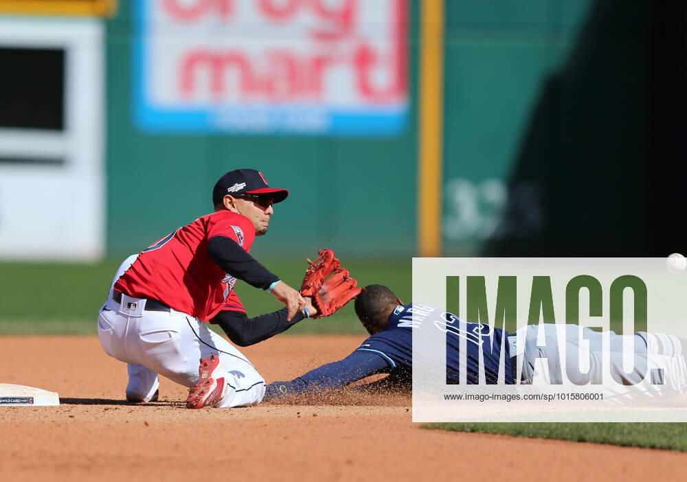 Cleveland Guardians second baseman Andres Gimenez puts the tag on Tampa Bay Rays Manuel Margot on a throw from catcher Austin Hedges as Margot attempted to steal second in the seventh inning in an American League Wild Card game at Progressive Field in Cleveland, Ohio on Saturday, October 8, 2022. CLE20221008722 AARONxJOSEFCZYK