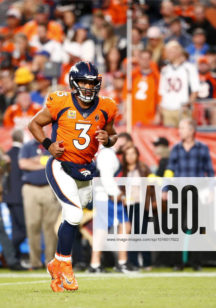 DENVER, CO - OCTOBER 06: Denver Broncos Quarterback Russell Wilson (3) runs onto the field during an NFL, American Football Herren, USA game between the Indianapolis Colts and the Denver Broncos on October 06, 2022 at Empower Field at Mile High in Denver CO. (Photo by Jeffrey Brown Icon Sportswire) NFL: OCT 06 Colts at Broncos Icon100622081
