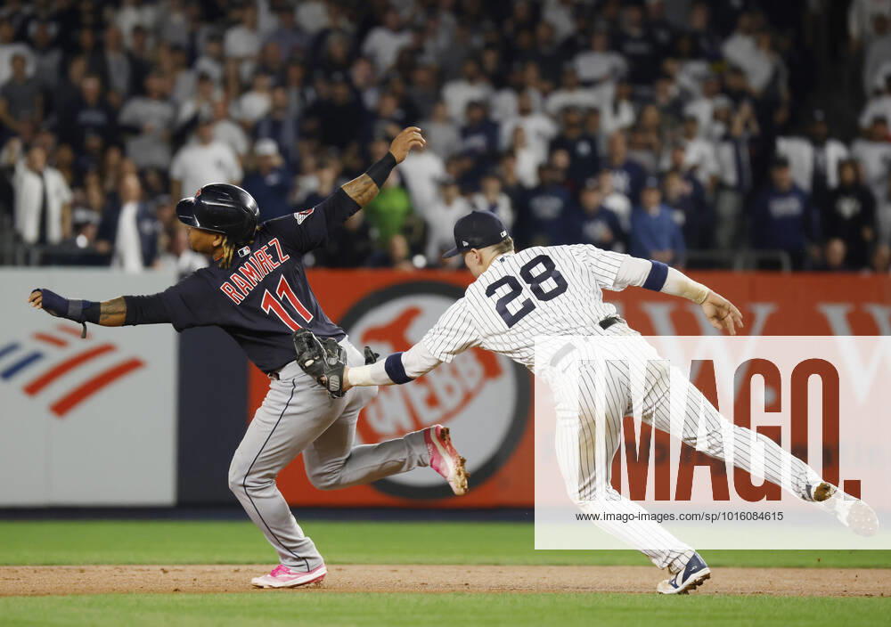 Cleveland Guardians Jose Ramirez (11) is tagged out by New York Yankees second baseman Josh Donaldson for a double play in the eighth inning in game one of an American League Division Series at Yankee Stadium in New York City on Tuesday, October 11, 2022. NYP20221011726 JOHNxANGELILLO