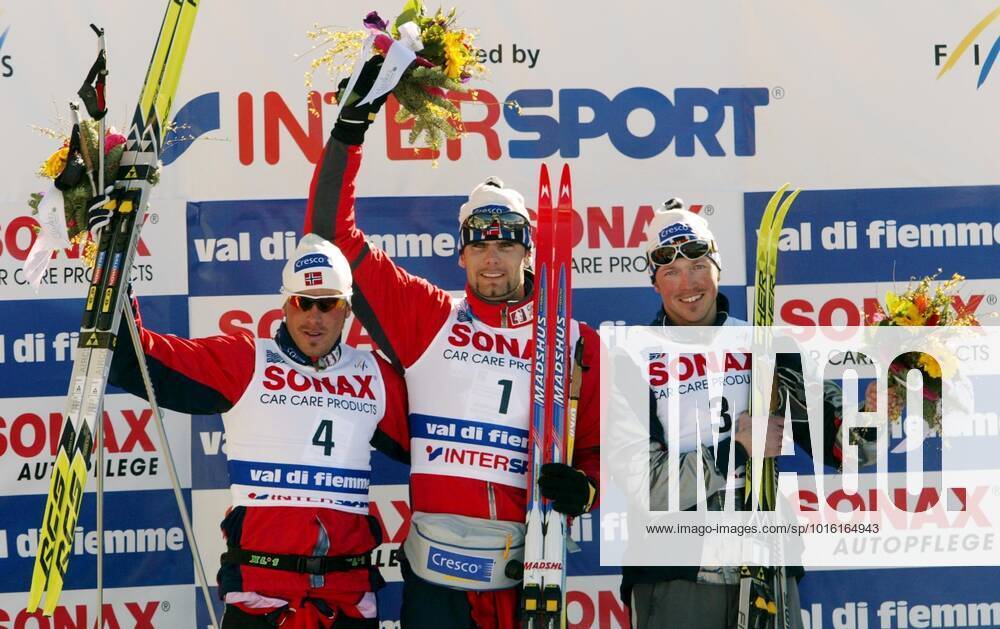 VAL DI FIEMME 030219 Norway took an overall victory in the 30 km mass start Wednesday February 19, 2003 during the Skiing WC in Val Di Fiemme, Italy Thomas Alsgaard, in the middle of the podium, with second Anders Aukland on the left and third Frode Estil on the right VAL DI FIEMME ITALY SKIING