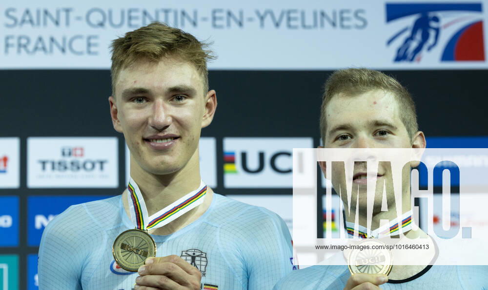 Belgian Lindsay De Vylder and Belgian Fabio Van Den Bossche pose for photographer with their bronze medal at men s Madison race on day five of the UCI Track World Championships, at the Saint-Quentin-en-Yvelines velodrome in Montigny-le-Bretonneux, France, Sunday 16 October 2022. The World Championships take place from 12 to 16 October 2022. BENOITxDOPPAGNE x47142196x