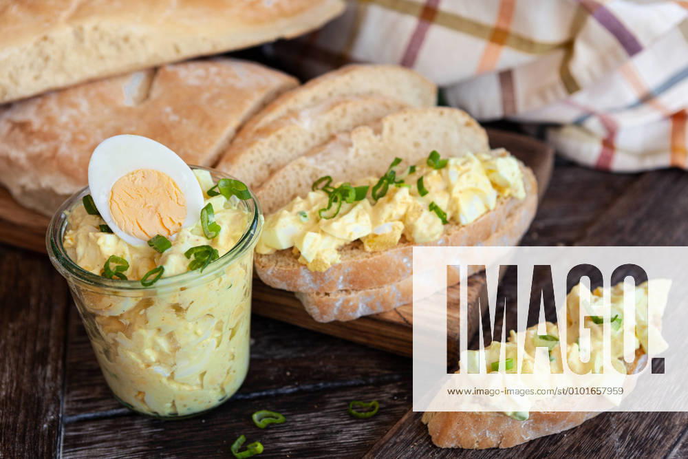 Rustic white bread with homemade egg salad 1079706165