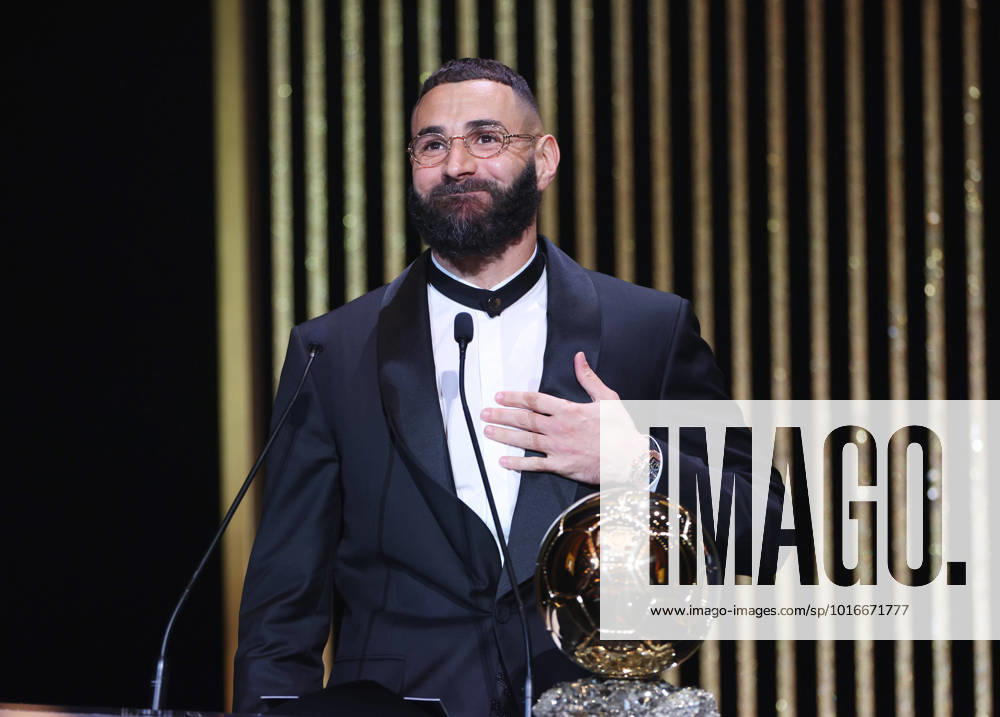 KW42 (221018) -- PARIS, Oct. 18, 2022 -- Real Madrid s French forward Karim Benzema speaks after receiving the men s Ballon d Or Trophy during the 2022 Ballon d Or France Football award ceremony at the Theatre du Chatelet in Paris, France, Oct. 17, 2022. ) (SP)FRANCE-PARIS-FOOTBALL-BALLON D OR CEREMONY GaoxJing