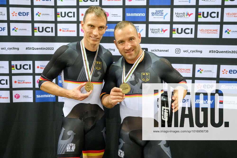 UCI Para Cycling Track World Championship 2022 21 10 2022 Day 2 SAINT QUENTIN EN YVELINES, FRANCE OCTOBER 21 Thomas Ulbricht of Germany local club PSC Berlin, class MB and his guide Robert Foerstemann local club PSV Rostock, guide posing with the bronze medal during the award ceremonies of the mens tandem 1000m sprint on day 2 of the UCI Para Cycling Track World Championship 2022 at the Velodrome National of Saint Quentin en Yvelines on 21 10 2022 in Ile de France