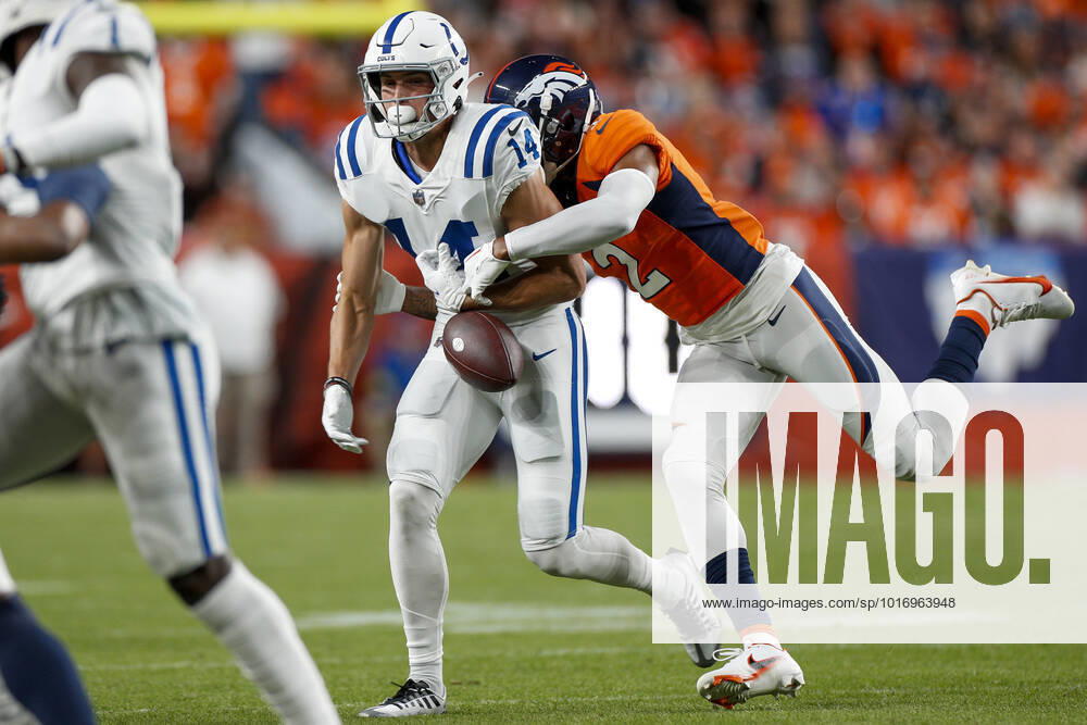 DENVER, CO - OCTOBER 06: Denver Broncos cornerback Pat Surtain II hits the ball causing a fumble by Indianapolis Colts wide receiver Alec Pierce (14) in the first half of an NFL, American Football Herren, USA game between the Indianapolis Colts and the Denver Broncos at Empower Field at Mile High on October 06, 2022 in Denver, Colorado. (Photo by Brandon Sloter Icon Sportswire) NFL: OCT 06 Colts at Broncos Icon221006138