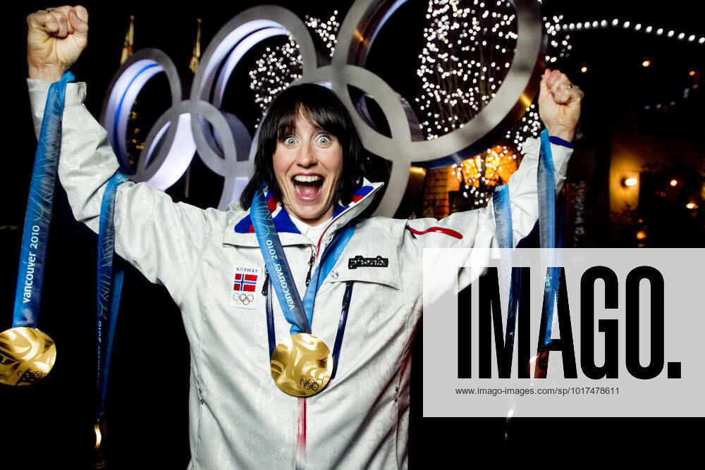 VANCOUVER, WHISTLER, CANADA 20100228 Marit Bjorgen with all the medals she won in cross country skiing in Whistler Olympic Park during the Olympics in Vancouver 2010 Three gold relay, skiathlon, Team Sprint , a silver in the 30 km and a bronze in the 10 km VANCOUVER, WHISTLER CANADA