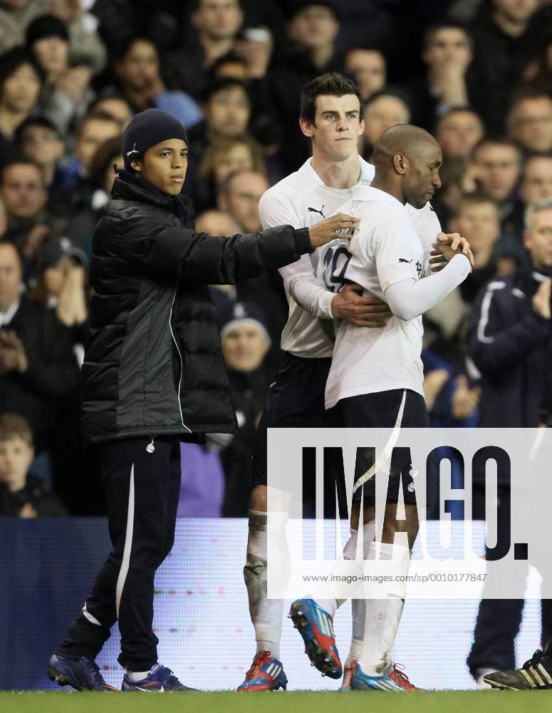 Tottenhams Jermain Defoe cries as Boltons Fabrice Muamba collapses on the pitch - Tottenham Hotspur vs. Bolton Wanderers - FA Cup QuarterFinal at White Hart Lane, London. 17th March 2012 .
