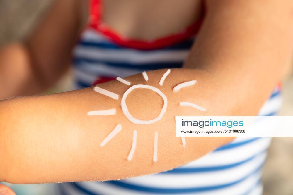 Sun Drawn On Girl s Hand With Sunscreen Lotion