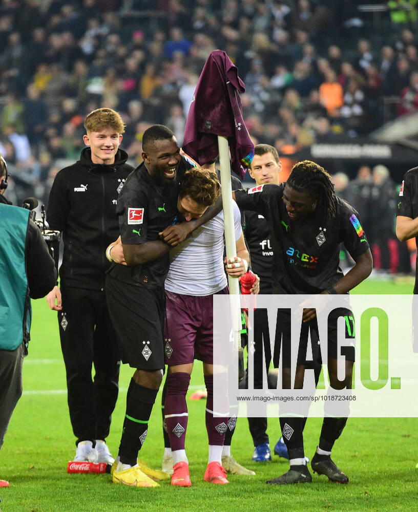 Moenchengladbach Football, Men, 1 Soccer Bundesliga, Season 2022 2023, Borussia Moenchengladbach vs Borussia Dortmund Marcus Thuram Gladbach, center left is happy after the game with goalkeeper Jan Olschowsky Gladbach, center right DFL regulations prohibit any use of photographs as image sequences and or quasi video Borussia Park NRW Germany