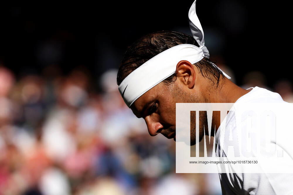 Rafael Nadal during his second hand match against Ricardas Berankis of Lithuania on Centre Court at Wimbledon, 2022. Rafael Nadal wins second round match during the 2022 Championships at Wimbledon