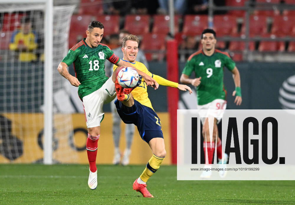 GIRONA 20221116 Mexicos Andres Guardado and Swedens Samuel Gustafson fight for the ball during the international match between Sweden and Mexico at the Estadi Montilivi in Girona GIRONA SPAIN FOOTBALL