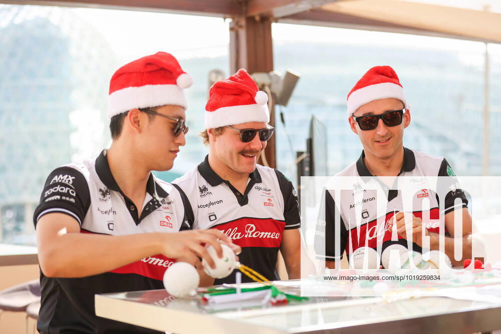 KW46 ZHOU Guanyu (chi), Alfa Romeo F1 Team ORLEN C42, BOTTAS Valtteri (fin), Alfa Romeo F1 Team ORLEN C42, KUBICA Robert (pol), Alfa Romeo F1 Team ORLEN C42, portrait during the Formula 1 Etihad Airways Abu Dhabi Grand Prix 2022, 22nd round of the 2022 FIA Formula One World Championship, WM, Weltmeisterschaft from November 18 to 20, 2022 on the Yas Marina Circuit, in Yas Island, Abu Dhabi - F1 - ABU DHABI GRAND PRIX 2022 DPPI Panoramic 00122049_AV6_5079