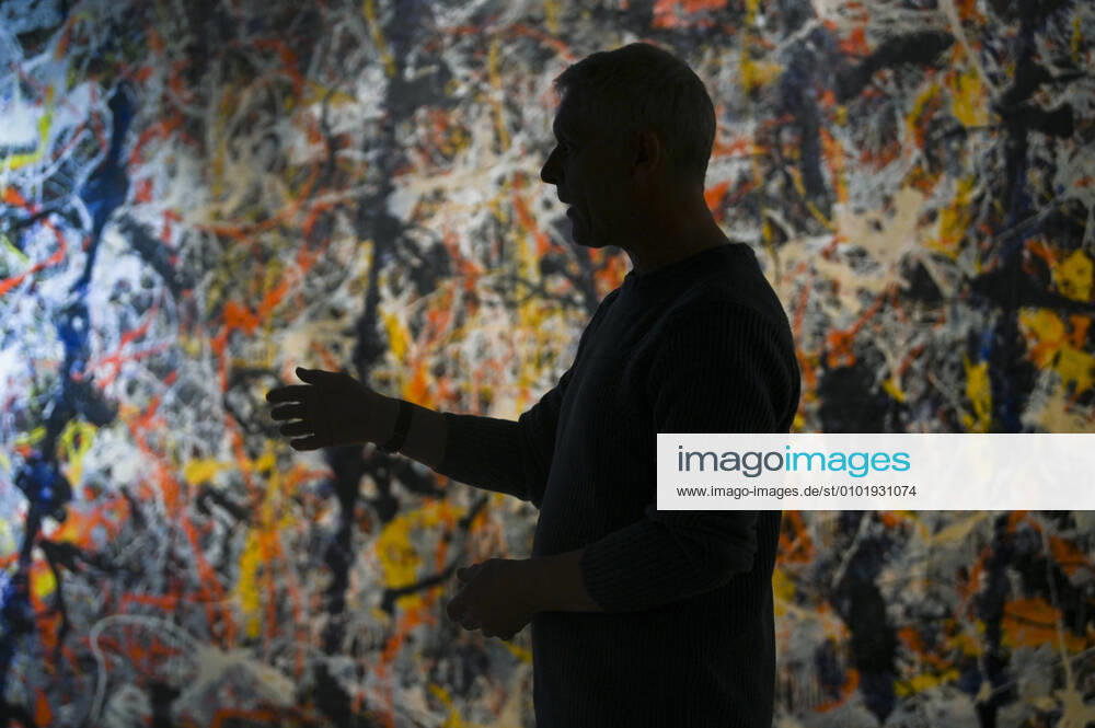 NATIONAL GALLERY BLUE POLES CONSERVATION WORK, National Gallery of Australia Senior paintings conservator David Wise works examines the paintwork of Blue Poles by American artist Jackson Pollock during conservation work at the National Gallery of Australia in Canberra, Tuesday, June 30, 2020. Regarded as one of the most important and valuable artworks, the National Gallery of Australia partly used the shutdown during the Coronavirus pandemic to examine and conserve the 47 year old painting for the first time since purchasing it in 1973. ( NO ARCHIVING, , NO USE IN BOOKS WITHOUT CONSENT CANBERRA ACT AUSTRALIA
