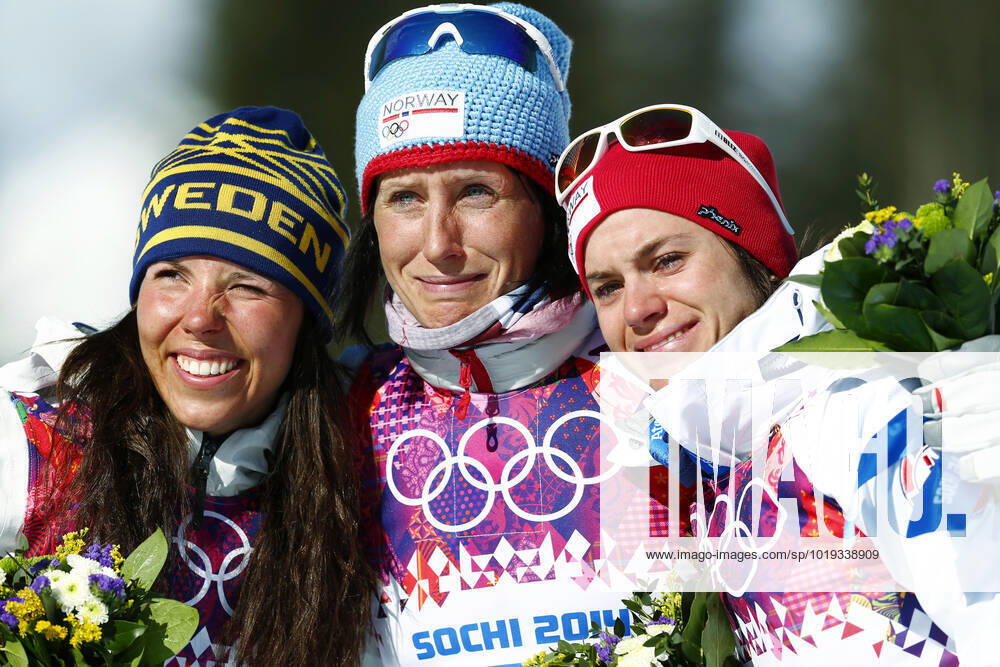 SOTSJI, RUSSIA 20140208 Swedish athlete Charlotte Kalla left and Norwegian athletes Marit Bjorgen and Heidi Weng cry during the flower ceremony after winning the womens cross country skiing skiathlon competition in the Sochi 2014 Winter Olympics, Sochi, Russia, in the Laura Cross country Ski Biathlon Center, 8 th of February 2014 SOTJI RUSSIA