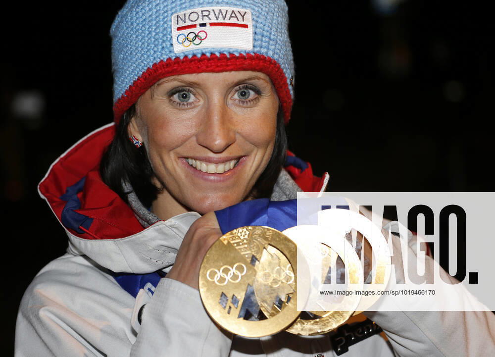 SOTSJI, RUSSIA 20140222 Winter Olympics, Olympic Games in Sochi 2014 Closing ceremony Langrenn 30 km kvinner Cross country Norwegian athletes Gold winner Marit Bjorgen showing her three gold medals after receiving the medal for the women s 30 km mass start free Cross country skiing competition in a spectacular way in the Sochi 2014 Winter Olympics, Sochi, Russia, in Fisht Olympic Stadium in the Closing ceremony, 23rd of February 2014 SOTJI RUSSIA