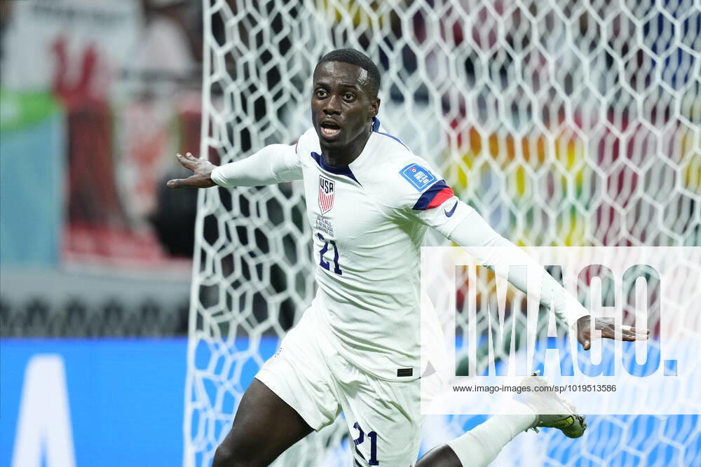USA v Wales: Group B - FIFA World Cup, WM, Weltmeisterschaft, Fussball Qatar 2022 Timothy Weah Centre-Forward of USA and LOSC Lille celebrates after scoring his sides first goal during the FIFA World Cup Qatar 2022 Group B match between USA and Wales at Ahmad Bin Ali Stadium on November 21, 2022 in Doha, Qatar. Doha Qatar