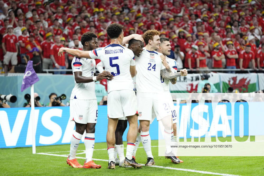 USA v Wales: Group B - FIFA World Cup, WM, Weltmeisterschaft, Fussball Qatar 2022 Timothy Weah Centre-Forward of USA and LOSC Lille celebrates after scoring his sides first goal during the FIFA World Cup Qatar 2022 Group B match between USA and Wales at Ahmad Bin Ali Stadium on November 21, 2022 in Doha, Qatar. Doha Qatar