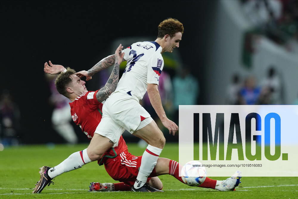 USA v Wales: Group B - FIFA World Cup, WM, Weltmeisterschaft, Fussball Qatar 2022 Josh Sargent Centre-Forward of USA and Norwich City and Joe Rodon Centre-Back of Wales and Stade Rennais FC compete for the ball during the FIFA World Cup Qatar 2022 Group B match between USA and Wales at Ahmad Bin Ali Stadium on November 21, 2022 in Doha, Qatar. Doha Qatar