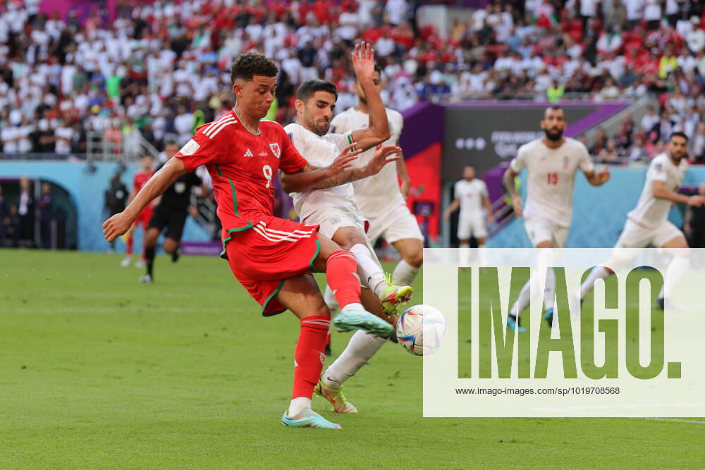 Wales v Iran 2022 FIFA World Cup, WM, Weltmeisterschaft, Fussball Brennan Johnson of Wales attempts a strike on goal during the 2022 FIFA World Cup Group B match at Ahmad Bin Ali Stadium, Al-Rayyan Content Not Available For UK Newspapers