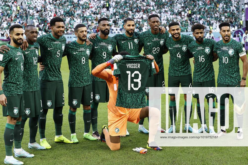 DOHA LR Mohammed Al Burayk of Saudi Arabia, Saud Abdulhamid of Saudi Arabia, Mohammed Al Burayk of Saudi Arabia, Abdulelah Al Malki of Saudi Arabia , Firas Al Buraikan of Saudi Arabia, Saleh Al Shehri of Saudi Arabia, Mohamed Kanno of Saudi Arabia, Abdulelah Al Amri of Saudi Arabia, Sami Al Najei of Saudi Arabia, Salem Al Dawsari of Saudi Arabia show a shirt for Yasir Al Shahrani of Saudi Arabia during the FIFA World Cup Qatar 2022 Group C match between Poland and Saudi Arabia at the Education City Stadium on November 26, 2022 in Doha, Qatar AP Dutch Height MAURICE OF STONE FIFA World Cup Qatar 2022 2022 ANPxSportx xMauricexvanxSteenxWKxIVx 458370884 originalFilename: 458370884