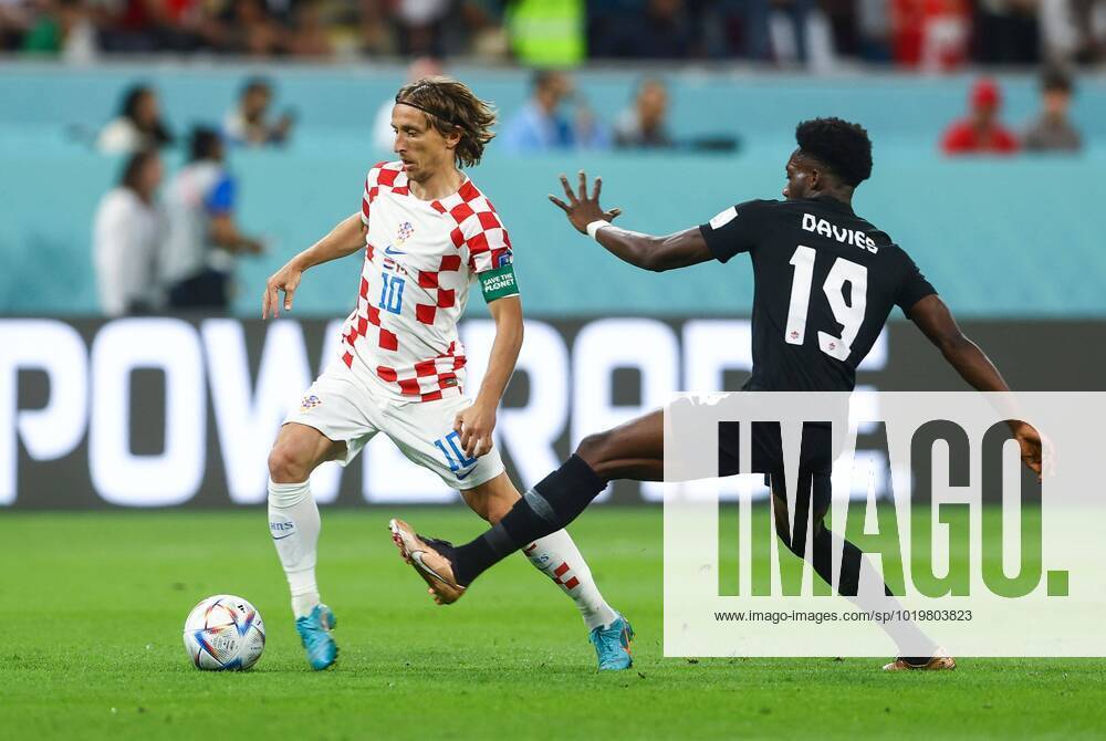 Mandatory Credit: Photo by Kieran McManus Shutterstock (13634907ac) Luka Modric of Croatia and Alphonso Davies of Canada Croatia v Canada, FIFA World Cup, WM, Weltmeisterschaft, Fussball 2022, Group F, Football, Khalifa International Stadium, Ar-Rayyan, Qatar - 27 Nov 2022 Editorial Use Only Croatia v Canada, FIFA World Cup 2022, Group F, Football, Khalifa International Stadium, Ar-Rayyan, Qatar - 27 Nov 2022 Editorial Use Only