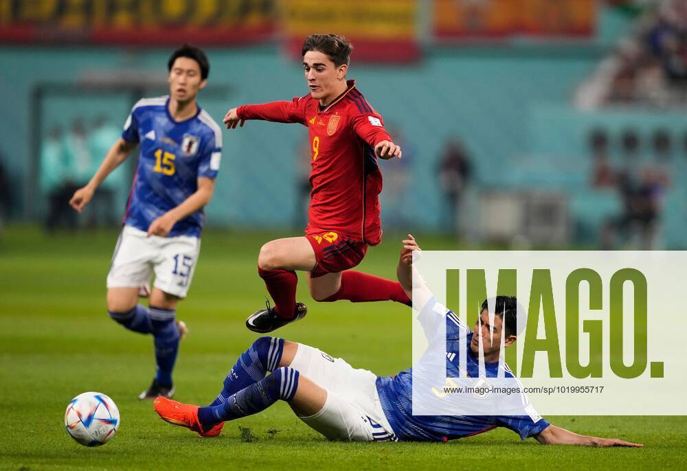 Mandatory Credit: Photo by Dave Shopland Shutterstock (13640378ad) Gavi of Spain tackled by Shogo Taniguchi of Japan Japan v Spain, FIFA World Cup, WM, Weltmeisterschaft, Fussball 2022, Group E, Football, Khalifa International Stadium, Ar-Rayyan, Qatar - 01 Dec 2022 Editorial Use Only Japan v Spain, FIFA World Cup 2022, Group E, Football, Khalifa International Stadium, Ar-Rayyan, Qatar - 01 Dec 2022 Editorial Use Only
