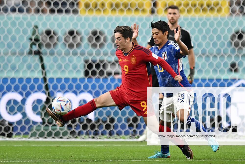 Russia Soccer World Cup Japan - Spain 8329374 01.12.2022 Spain s Gavi and Japan s Hidemasa Morita, right, struggle for a ball during the Qatar 2022 World Cup Group E soccer match between Japan and Spain, in Doha, Qatar. Grigory Sysoev Sputnik Doha Qatar