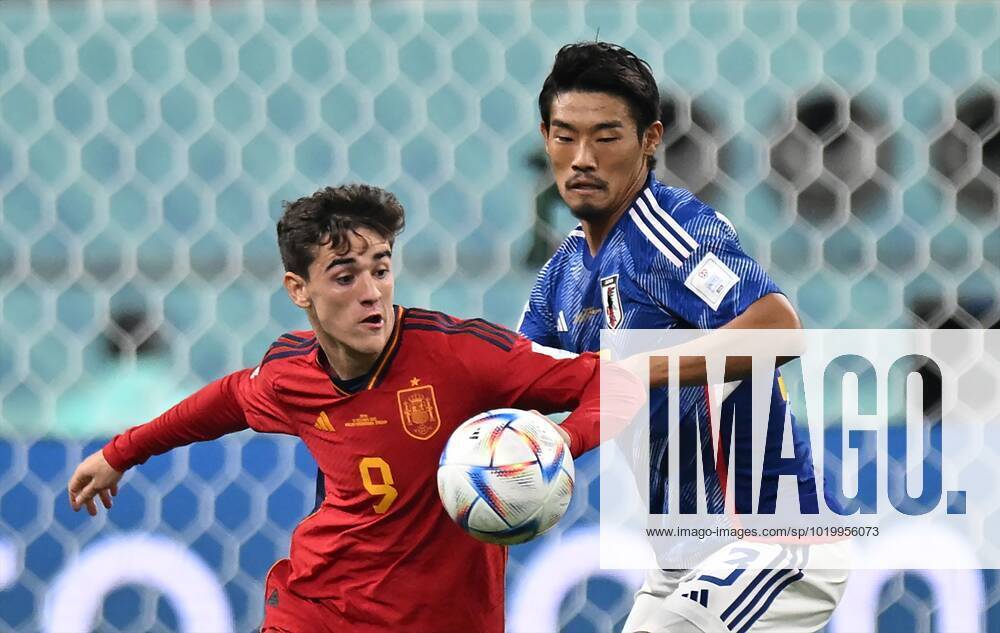 Russia Soccer World Cup Japan - Spain 8329375 01.12.2022 Spain s Gavi and Japan s Hidemasa Morita, right, struggle for a ball during the Qatar 2022 World Cup Group E soccer match between Japan and Spain, in Doha, Qatar. Grigory Sysoev Sputnik Doha Qatar