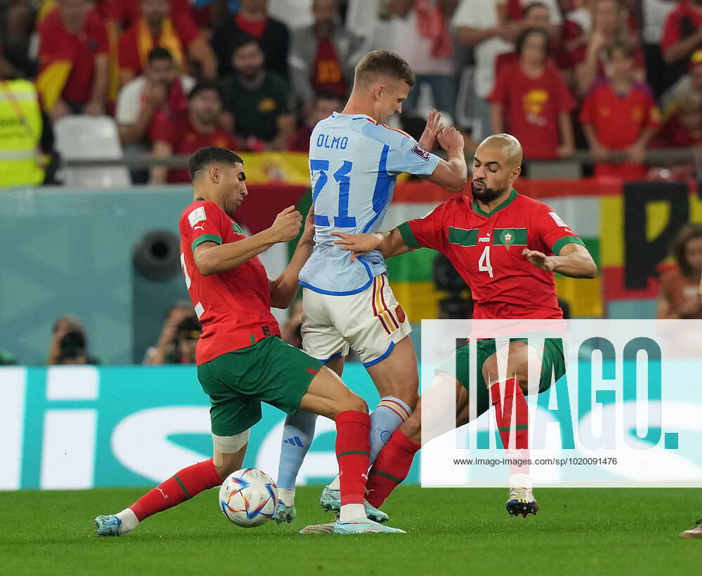 QAT, World Cup FIFA 2022, Round of 16, Morocco vs Spain 06 12 2022, Education City Stadium, Doha, QAT, World Cup FIFA 2022, Round of 16, Morocco vs Spain, pictured Morocco s defender Achraf Hakimi , Spains forward Dani Olmo , Morocco s midfielder Sofyan Amrabat. nordphotoxGmbHx xBratic nph00250