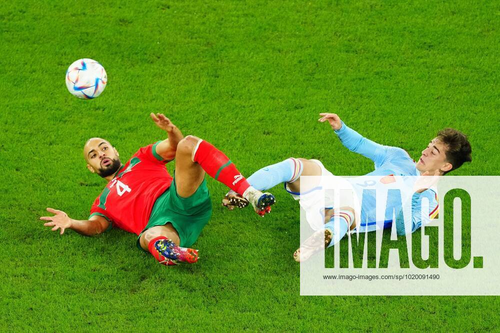 Mandatory Credit: Photo by Javier Garcia Shutterstock (13651659y) Gavi of Spain challenges Sofyan Amrabat of Morocco. Morocco v Spain, FIFA World Cup, WM, Weltmeisterschaft, Fussball 2022, Round of 16, Football, Education City Stadium, Doha, Qatar - 06 Dec 2022 Editorial Use Only Morocco v Spain, FIFA World Cup 2022, Round of 16, Football, Education City Stadium, Doha, Qatar - 06 Dec 2022 Editorial Use Only