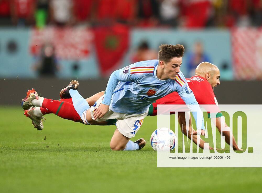 Mandatory Credit: Photo by Michael Zemanek Shutterstock (13651657z) Gavi of Spain challenges Sofyan Amrabat of Morocco. Morocco v Spain, FIFA World Cup, WM, Weltmeisterschaft, Fussball 2022, Round of 16, Football, Education City Stadium, Doha, Qatar - 06 Dec 2022 Editorial Use Only Morocco v Spain, FIFA World Cup 2022, Round of 16, Football, Education City Stadium, Doha, Qatar - 06 Dec 2022 Editorial Use Only