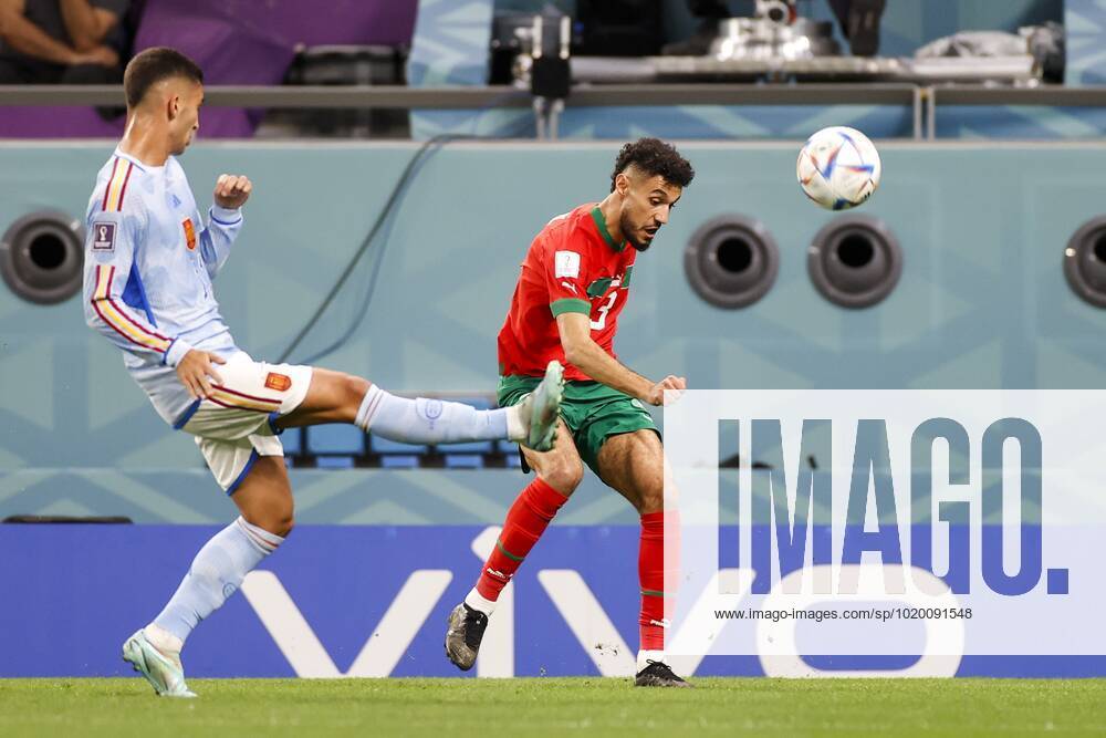 DOHA, 06-12-2022, Stadium Education City, World Cup round of 16 between Morocco - Spain. (R-L) Morocco player Noussair Mazraoui and Spain player Ferran Torres Morocco - Spain x19458459x