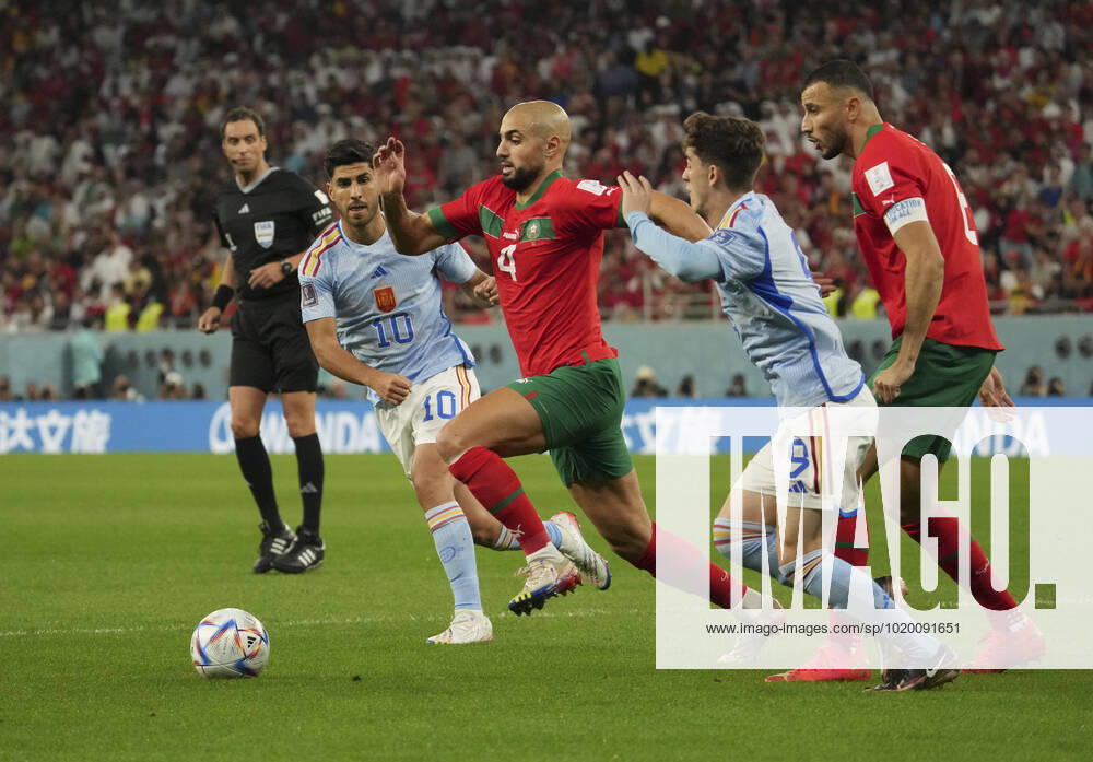 (221206) -- AL RAYYAN, Dec. 6, 2022 -- Sofyan Amrabat (3rd L) of Morocco competes during the Round of 16 match between Morocco and Spain of the 2022 FIFA World Cup, WM, Weltmeisterschaft, Fussball at Education City Stadium in Al Rayyan, Qatar, Dec. 6, 2022. ) (SP)QATAR-AL RAYYAN-2022 WORLD CUP-ROUND OF 16-MAR VS ESP LixGang