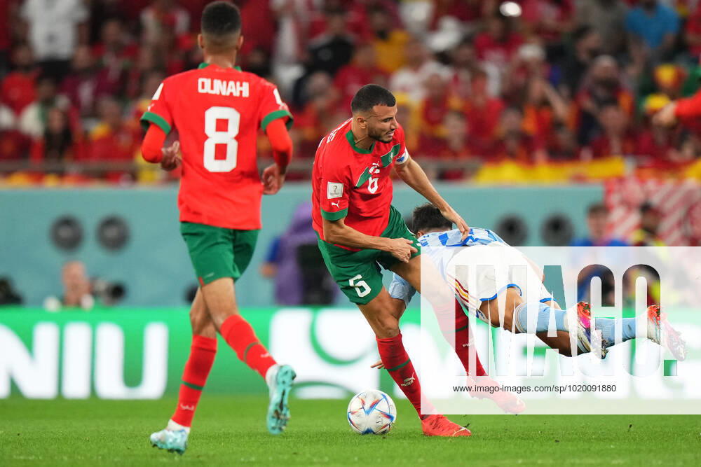 QAT: Spain v Germany. FIFA World Cup, WM, Weltmeisterschaft, Fussball Qatar 2022 Romain Sais of Morocco and Marco Asensio of Spain during the FIFA World Cup Qatar 2022 match, Group E, between Spain and Germany played at Al Bayt Stadium on Nov 27, 2022 in Al Khor, Qatar.