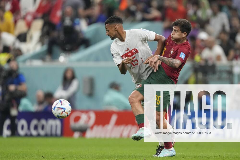 AL DAAYEN, 06-12-2022, Lusail Stadium, World Cup 2022 in Qatar game between Portugal and Switzerland. r Switzerland player Djibril Sow, Portugal player Raphael Guerreiro Portugal - Switzerland x19460230x