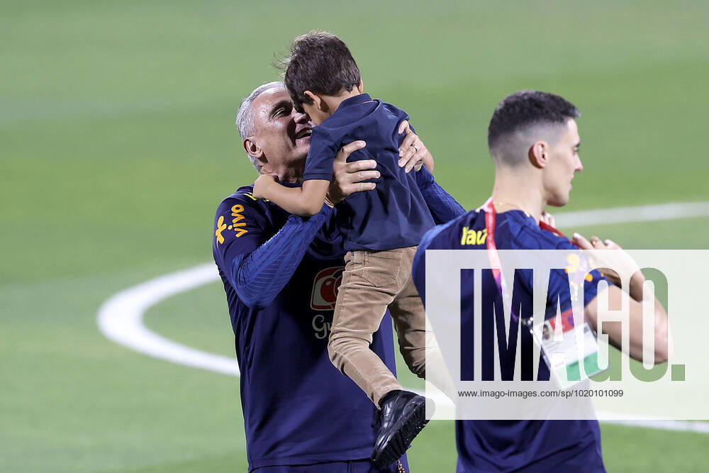 Brazil Training Session - FIFA World Cup, WM, Weltmeisterschaft, Fussball Qatar 2022 Head Coach of Brazil Tite plays with children during Brazil training session at Al Arabi SC Stadium in Doha, Qatar on December 6, 2022. GoranxStanzl PIXSELL